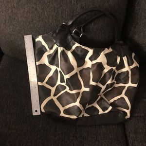 Giraffe patterned leather purse